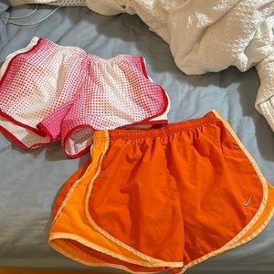 Nike running shorts. Both size adult small.